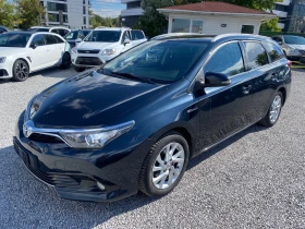 Обява за продажба на Toyota Auris 1.8 HIBRID ~18 680 лв. - изображение 1