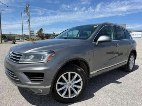 VW Touareg * SPORTLINE V6 | AWD | FULLY LOADED * CARFAX * ЦЕН, снимка 1