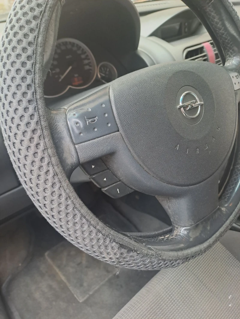 Opel Corsa 1.4 газ климатроник, снимка 15 - Автомобили и джипове - 53446236
