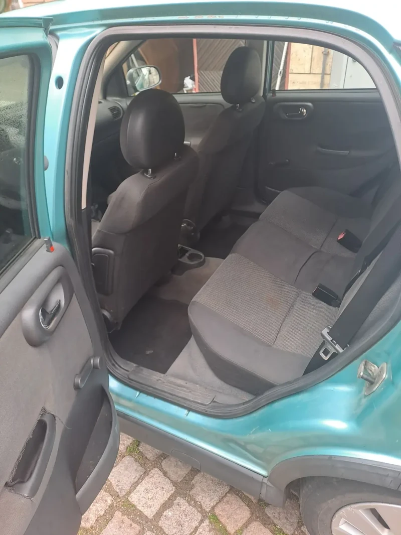 Opel Corsa 1.4 газ климатроник, снимка 12 - Автомобили и джипове - 53446236
