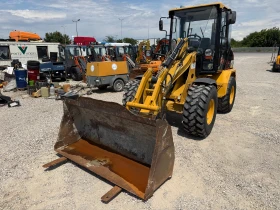 Челен товарач Caterpillar 906, снимка 5