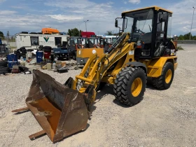 Челен товарач Caterpillar 906, снимка 4