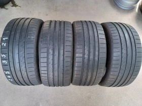      265/35R21