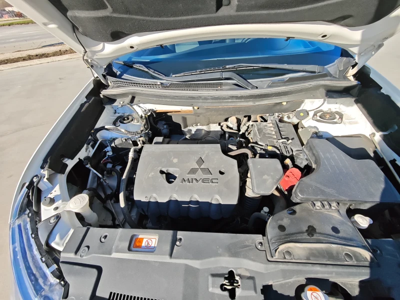 Mitsubishi Outlander 2.0 - Бензин - Автоматични - 150 hp, снимка 13 - Автомобили и джипове - 53044452