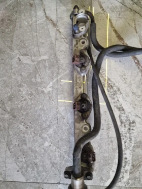 95XF-9D280AB горивна рейка FORD 