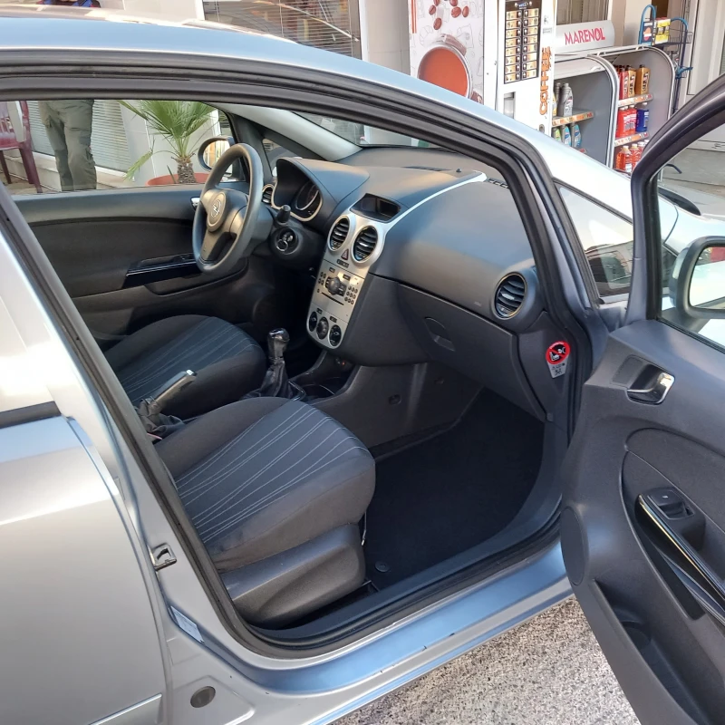 Opel Corsa, снимка 8 - Автомобили и джипове - 47429421