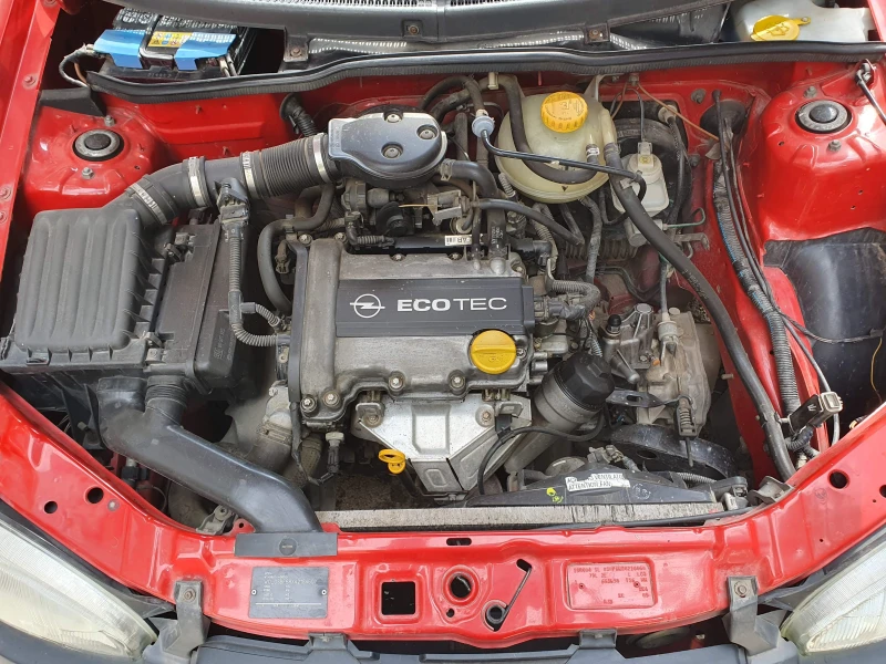 Opel Corsa 1.0i 12v B, снимка 12 - Автомобили и джипове - 47130446