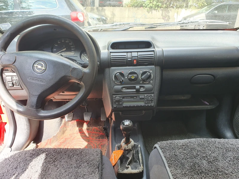 Opel Corsa 1.0i 12v B, снимка 9 - Автомобили и джипове - 47130446