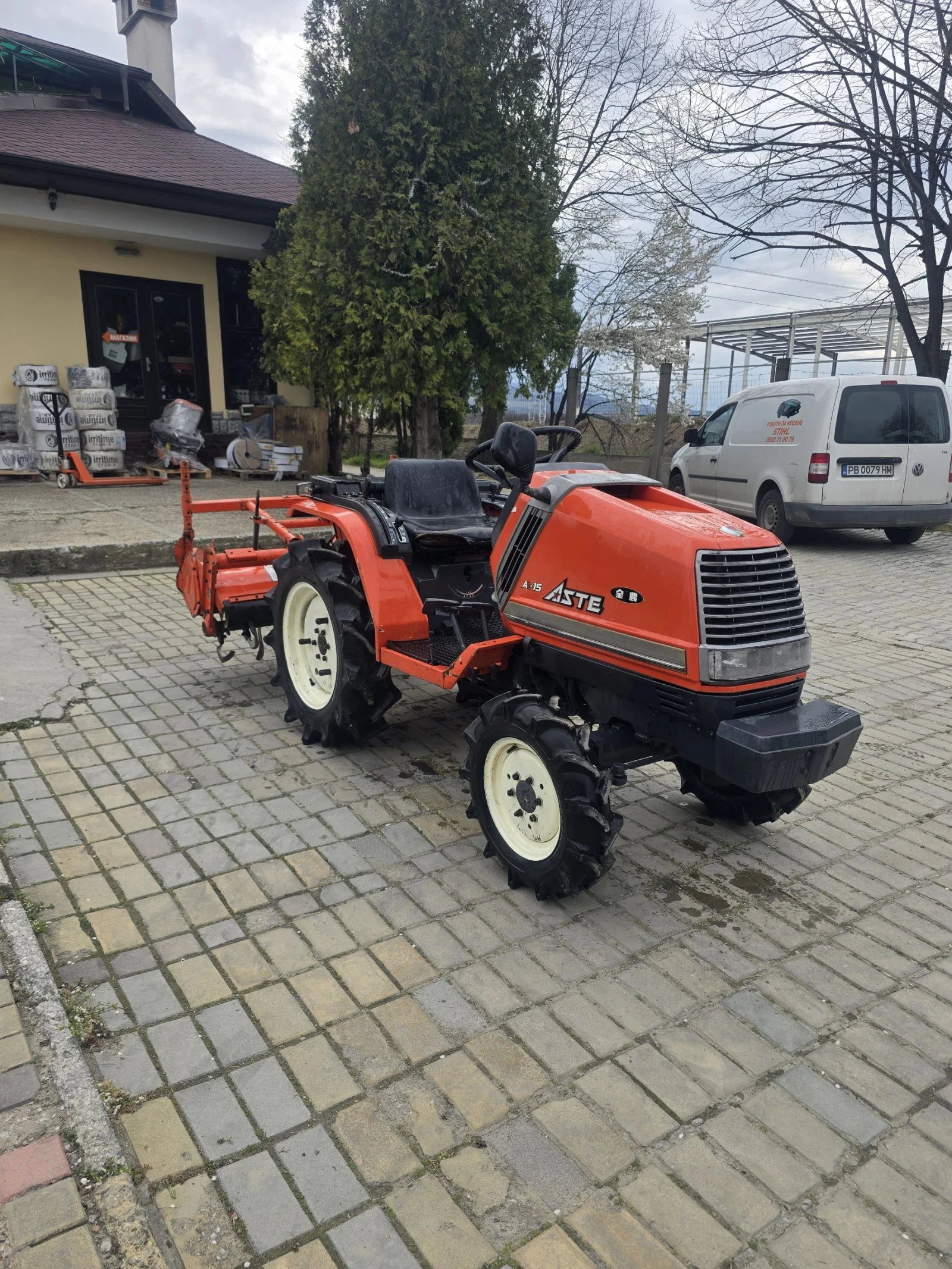 Трактор Kubota Aste 15