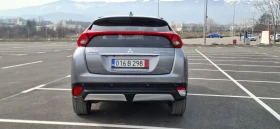 Mitsubishi Eclipse Cross 1.5 Autmat 4x4 SWISS   Head up - 17878 € / 34966.33 лв. - 73013596 6