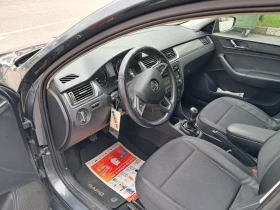 Skoda Rapid 1.6TDI 90 ks, снимка 11