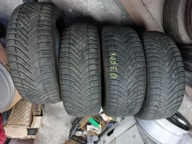 Гуми Зимни 215/55R16, снимка 1 - Гуми и джанти - 38517363