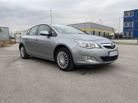 Opel Astra 1.7 CDTI, снимка 17 - Автомобили и джипове - 44350452