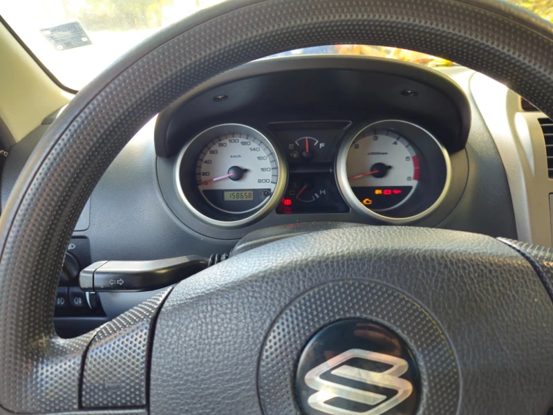 Suzuki Ignis 1.3 DDiS, снимка 9 - Автомобили и джипове - 52298035