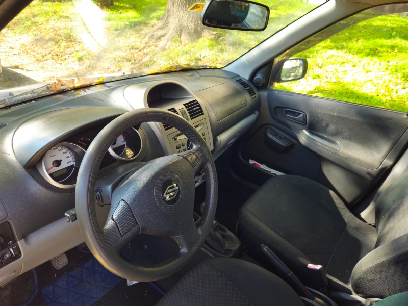 Suzuki Ignis 1.3 DDiS, снимка 10 - Автомобили и джипове - 52298035