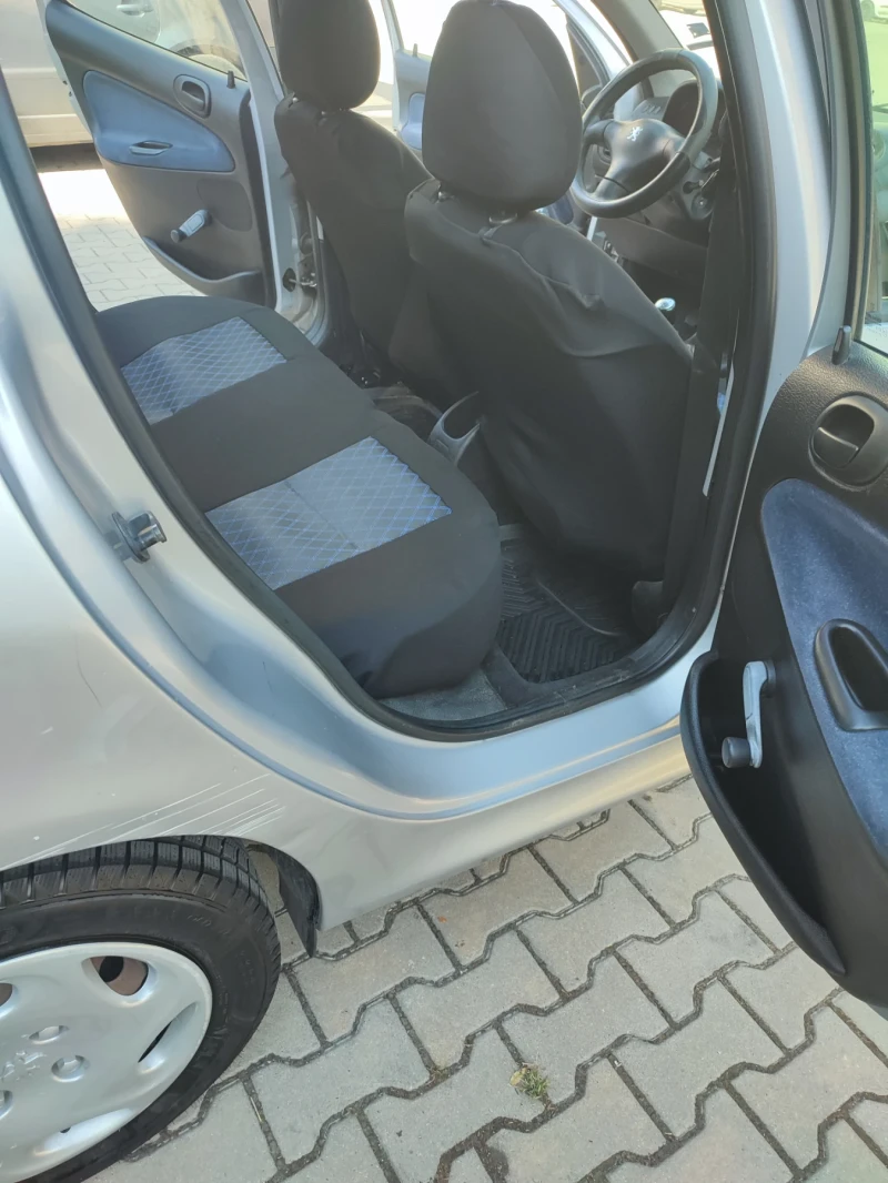 Peugeot 206 1.4 бензин, снимка 9 - Автомобили и джипове - 52409128
