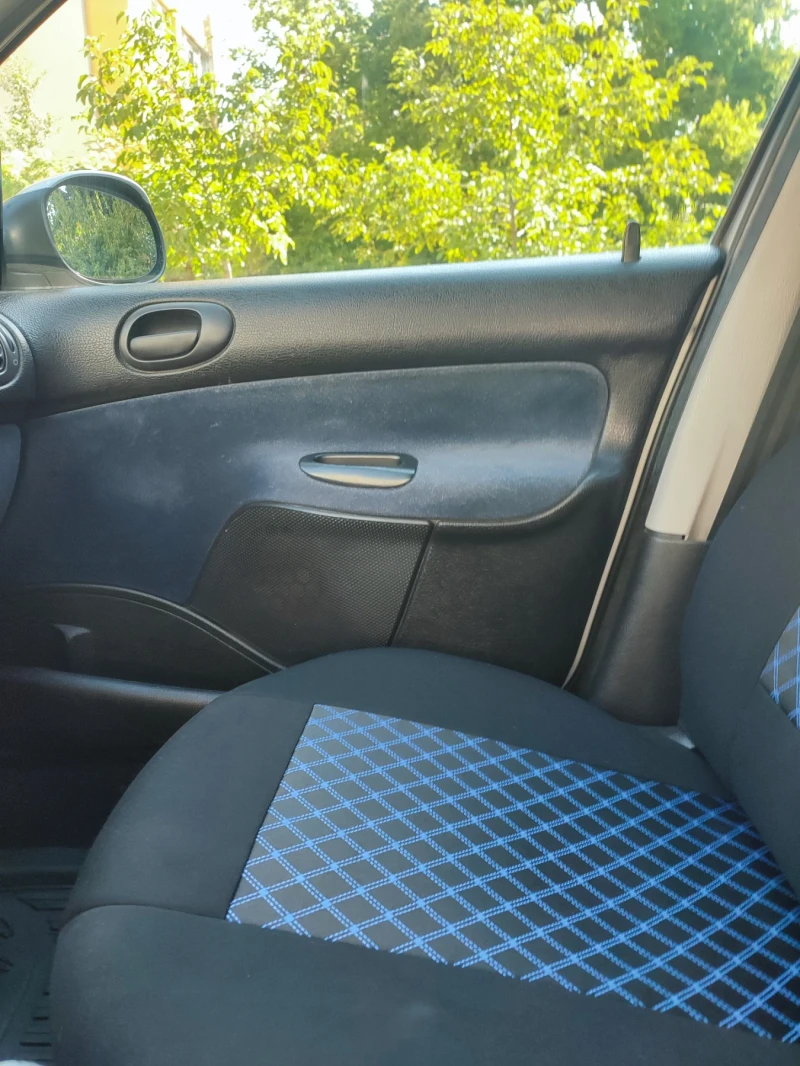 Peugeot 206 1.4 бензин, снимка 16 - Автомобили и джипове - 52409128