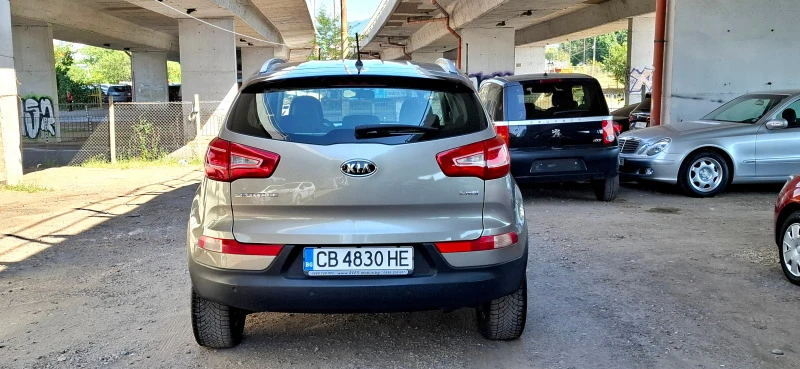 Kia Sportage 1, 7 CRDi, снимка 6 - Автомобили и джипове - 46590561