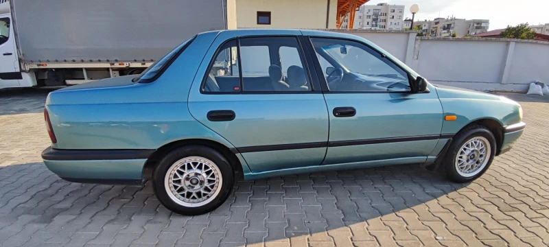 Nissan Sunny 1.6 SLX, снимка 3 - Автомобили и джипове - 51870564
