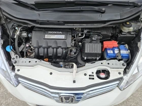 Honda Jazz 1.4i-VTEC Панорама + Пълна история в Хонда  - 14500 лв. / 7413.73 € - 91392615 9