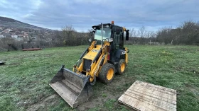 Багер JCB CX1