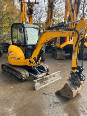 Багер JCB 8025 - изображение 1