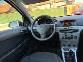 Opel Astra 2010г., снимка 12 - Автомобили и джипове - 53650749