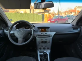 Opel Astra 2010г., снимка 11 - Автомобили и джипове - 53650749