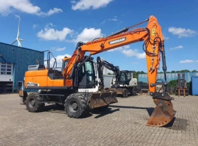 Багер DOOSAN DX140W, снимка 1 - Индустриална техника - 47450057