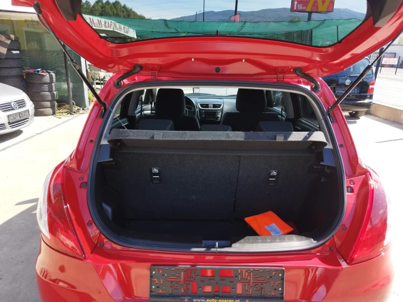 Suzuki Swift 1.2i 4x4, снимка 12 - Автомобили и джипове - 47313802