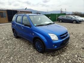 Suzuki Ignis 1.3i 4?4 Klima perfect , снимка 8