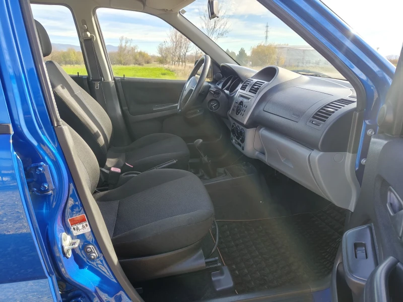 Suzuki Ignis 1.3i 4?4 Klima perfect , снимка 12 - Автомобили и джипове - 52336712