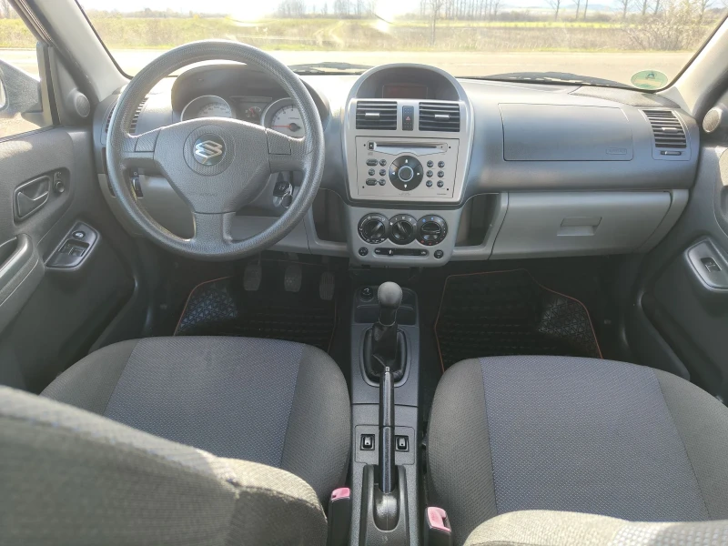 Suzuki Ignis 1.3i 4?4 Klima perfect , снимка 9 - Автомобили и джипове - 52336712