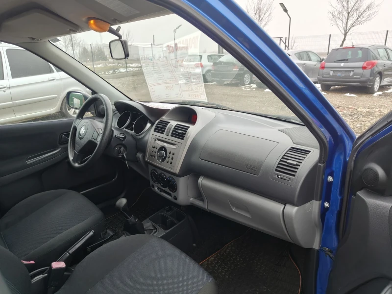 Suzuki Ignis 1.3i 4?4 Klima perfect , снимка 11 - Автомобили и джипове - 52336712