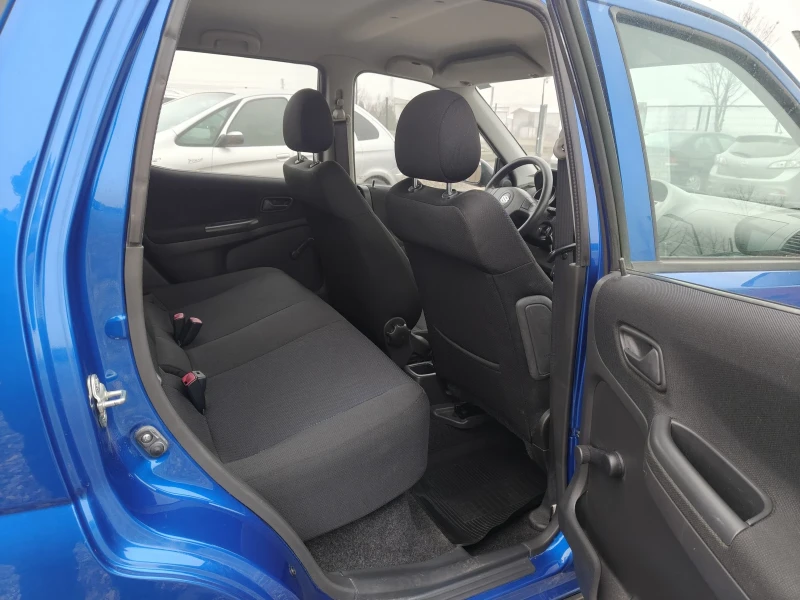 Suzuki Ignis 1.3i 4?4 Klima perfect , снимка 13 - Автомобили и джипове - 52336712