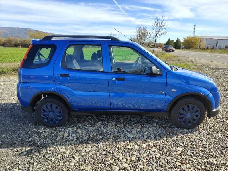 Suzuki Ignis 1.3i 4?4 Klima perfect , снимка 7 - Автомобили и джипове - 52336712