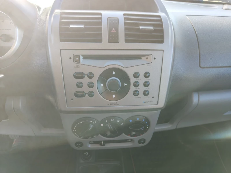 Suzuki Ignis 1.3i 4?4 Klima perfect , снимка 15 - Автомобили и джипове - 52336712