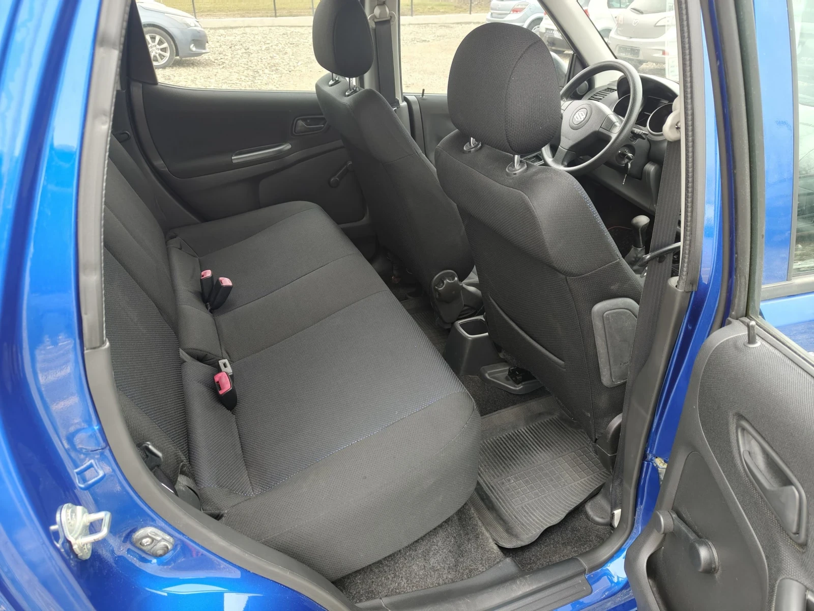 Suzuki Ignis 1.3i 4?4 Klima perfect , снимка 13 - Автомобили и джипове - 52336712