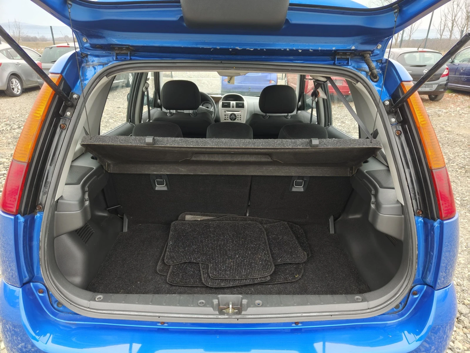 Suzuki Ignis 1.3i 4?4 Klima perfect , снимка 14 - Автомобили и джипове - 52336712