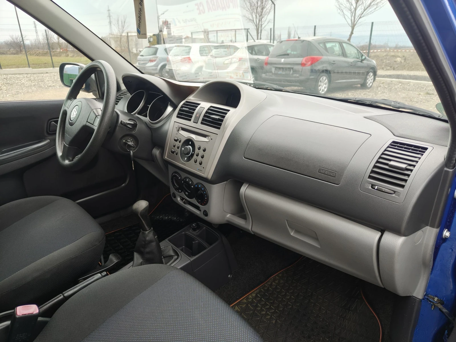 Suzuki Ignis 1.3i 4?4 Klima perfect , снимка 11 - Автомобили и джипове - 52336712