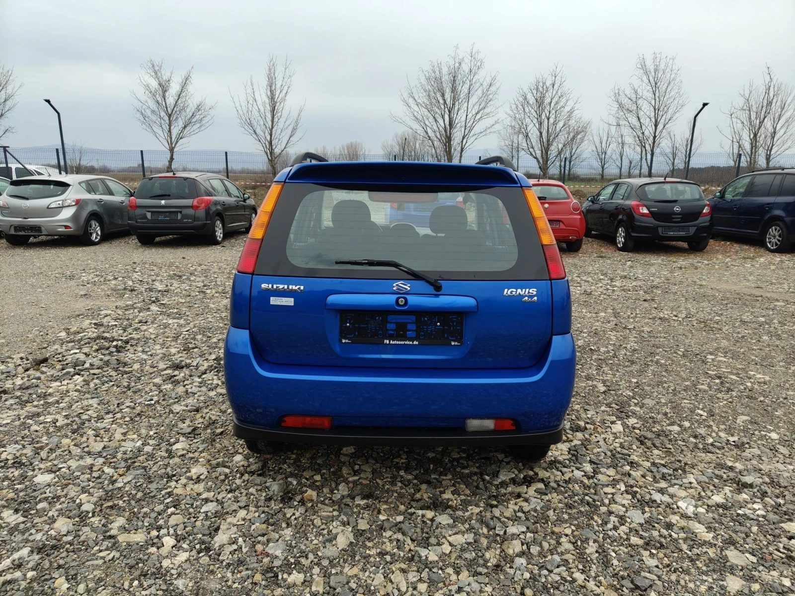 Suzuki Ignis 1.3i 4?4 Klima perfect , снимка 5 - Автомобили и джипове - 52336712