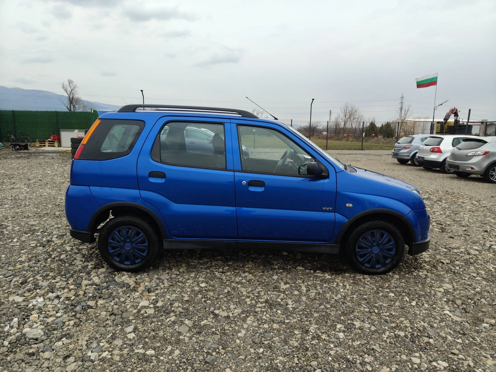 Suzuki Ignis 1.3i 4?4 Klima perfect , снимка 7 - Автомобили и джипове - 52336712