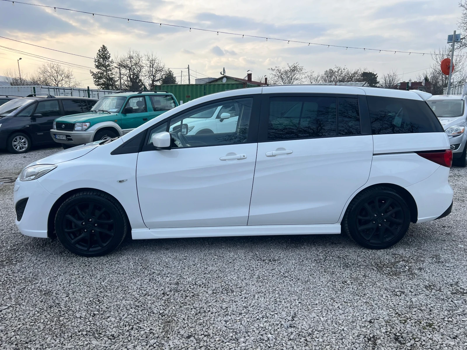 Mazda 5 facelift 2.0* КОЖА* ШВЕЙЦАРИЯ* 7 МЕСТЕН* , снимка 8 - Автомобили и джипове - 53889418