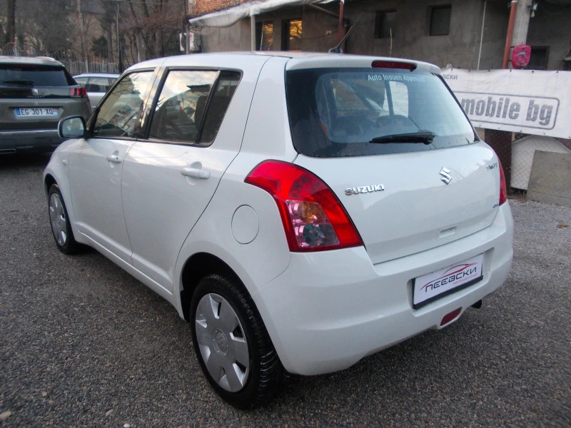 Suzuki Swift 1.3i-4x4-клима, снимка 4 - Автомобили и джипове - 44228280