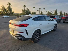 BMW X6 M50i* ЛАЗЕР* ВЪЗДУХ* Harman/Kardon* Подгрев* Обдух - 76900 лв. - 45924093 6
