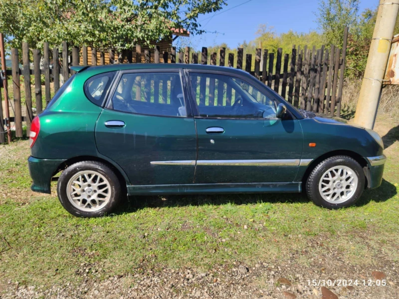 Daihatsu Sirion, снимка 12 - Автомобили и джипове - 47602452