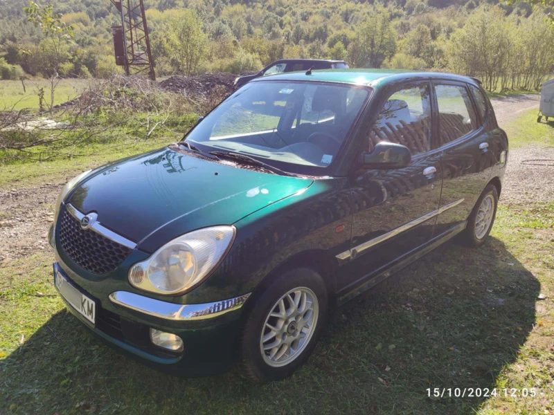 Daihatsu Sirion, снимка 13 - Автомобили и джипове - 47602452