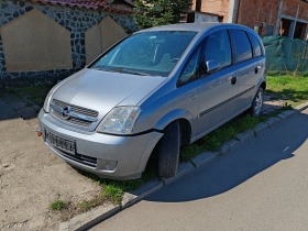 Opel Meriva 1,7, снимка 3 - Автомобили и джипове - 44857941