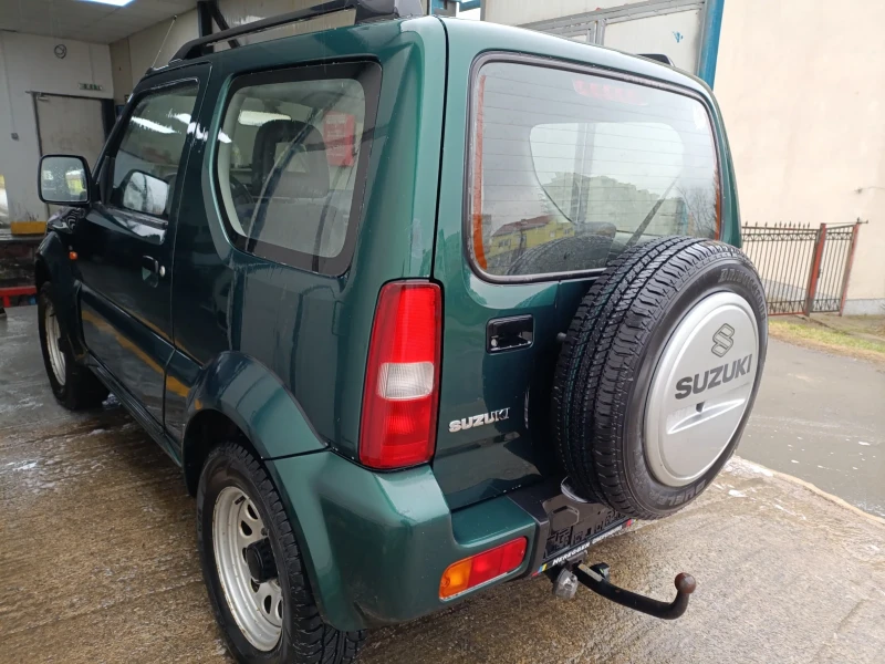 Suzuki Jimny 1.3ie 4x4 86kc, снимка 12 - Автомобили и джипове - 52891915