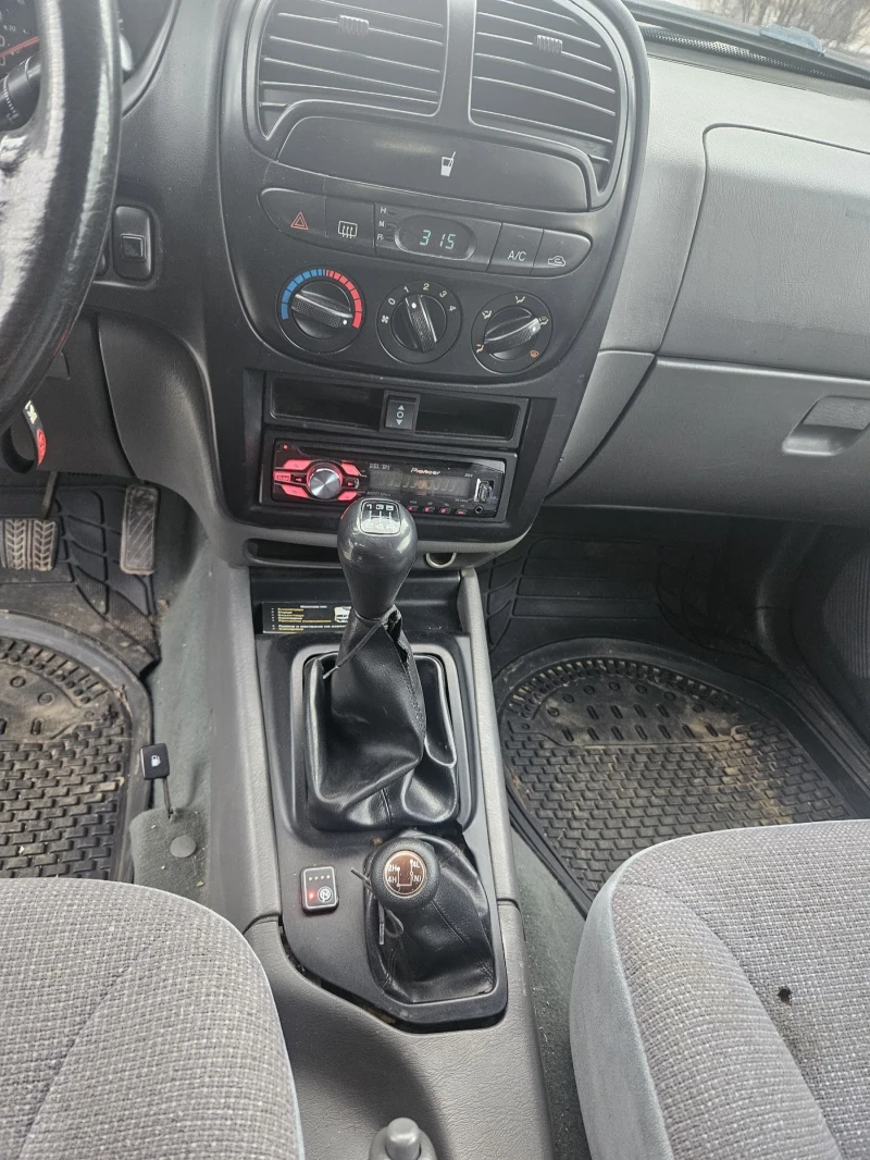 Kia Sportage, снимка 7 - Автомобили и джипове - 52989794